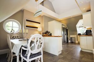 Kitchen/Dining with Vaulted Ceiling- click for photo gallery
